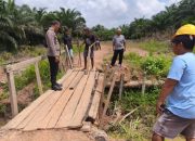 Kapolsek Bagan Sinembah Cek Progres Pembangunan Jembatan Merah Putih Presisi di Bahtera Makmur Kota